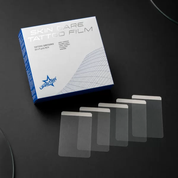 059-unistar-skin-care-film-5.webp UNISTAR Skin Care tattoo film dressing - 5 pieces - 12,5 x 12,5 cm